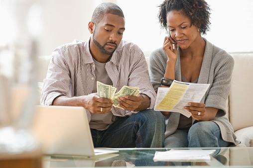 husband-and-wife-counting-money.jpg