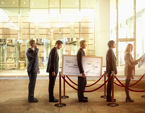 people-standing-in-line-at-the-bank.jpg