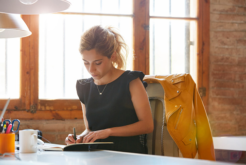 woman-Wrtting-in-Journal.jpg